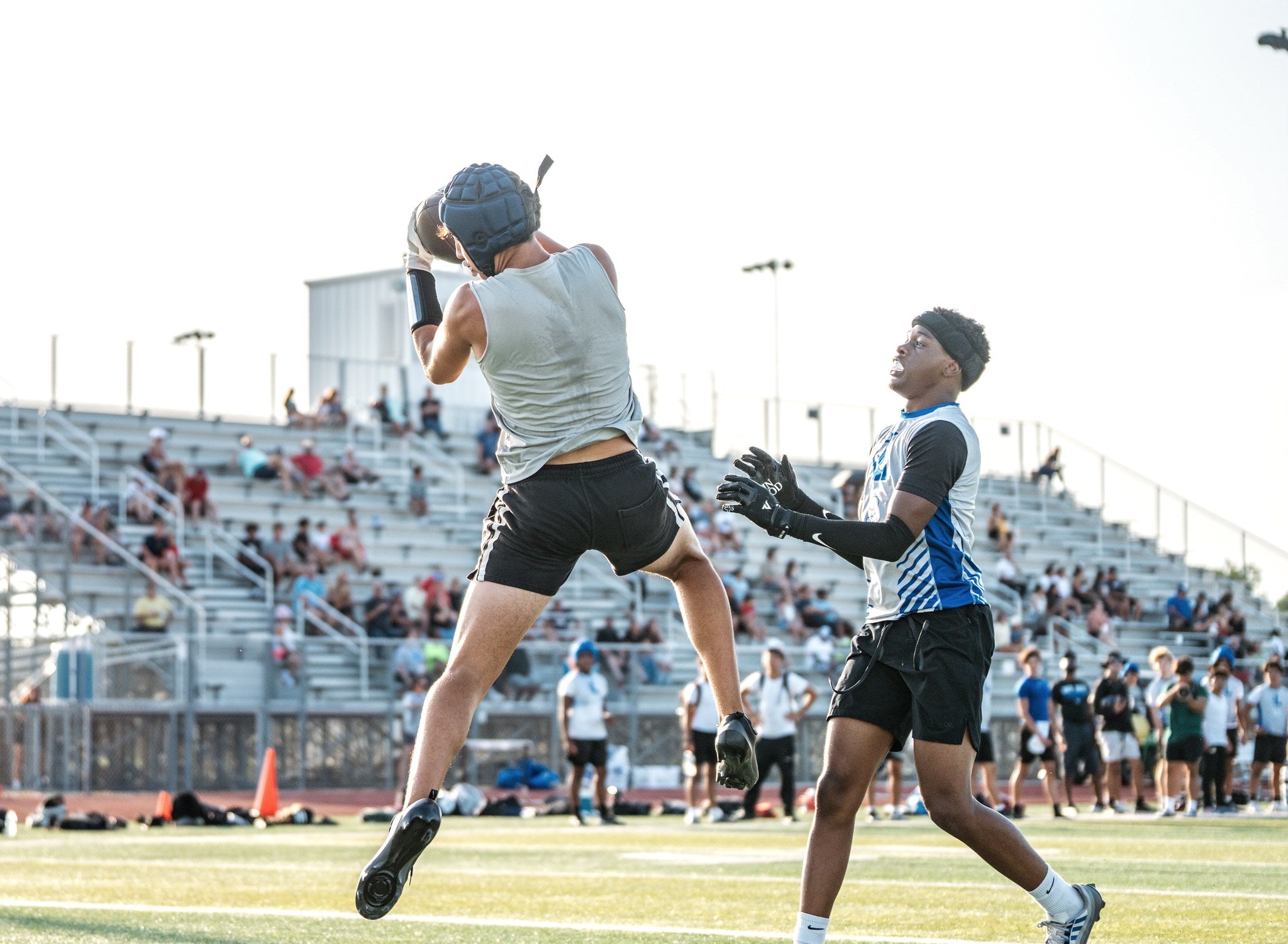 Football team during summer practice with proactive heat safety measures